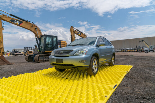 Small-Vehicle-Tire-Driving-Over-FODS-Reusable-Construction-Entrance-System_Construction-Entrance-Mats-TC-1_Trackout-Cont